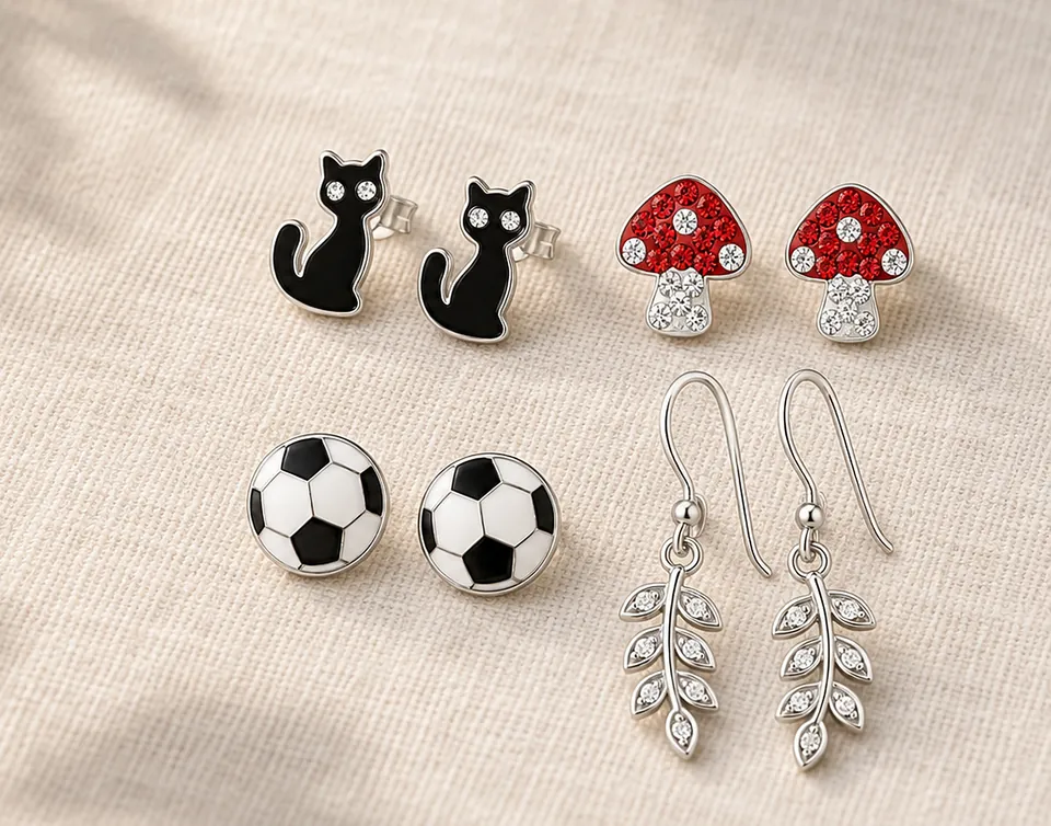 Black cat, toadstool, football and leaf drop earrings on warm linen